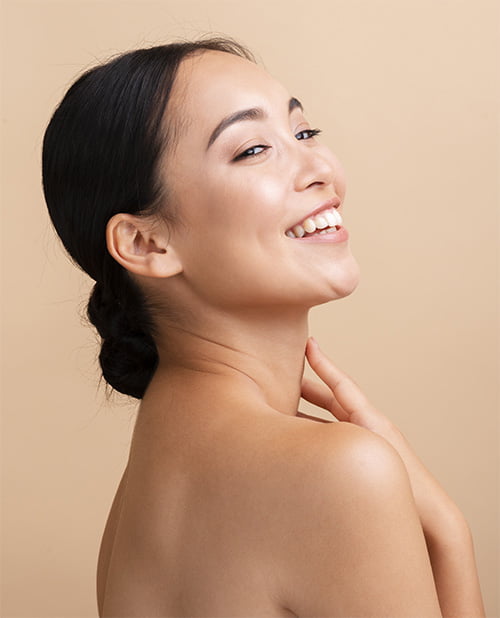 close-up-asian-woman-with-wide-smile-copy-space